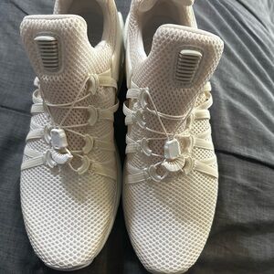 Nike White Gravity Shocks with Unique Lacing System